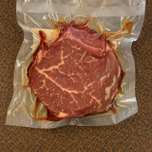 Fresh steak in vacuum-sealed packaging