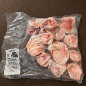 Frozen beef marrow bones in plastic bag
