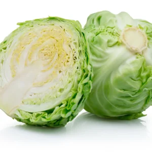 Halved and whole Brussels sprouts on white background