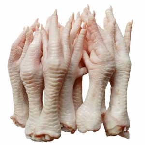 Raw chicken feet on white background