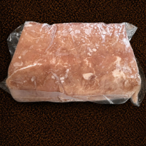 Sealed block of frozen meat