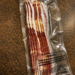 Unopened bacon in plastic packaging