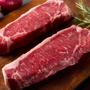 Fresh beef steaks with herbs