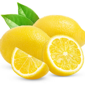 Fresh whole and sliced lemons with leaves