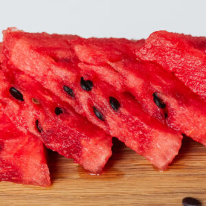 Juicy watermelon slices with black seeds