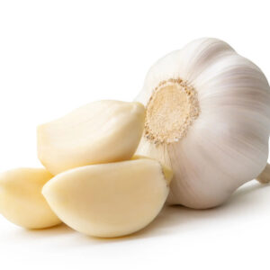 Garlic bulb with peeled cloves on white